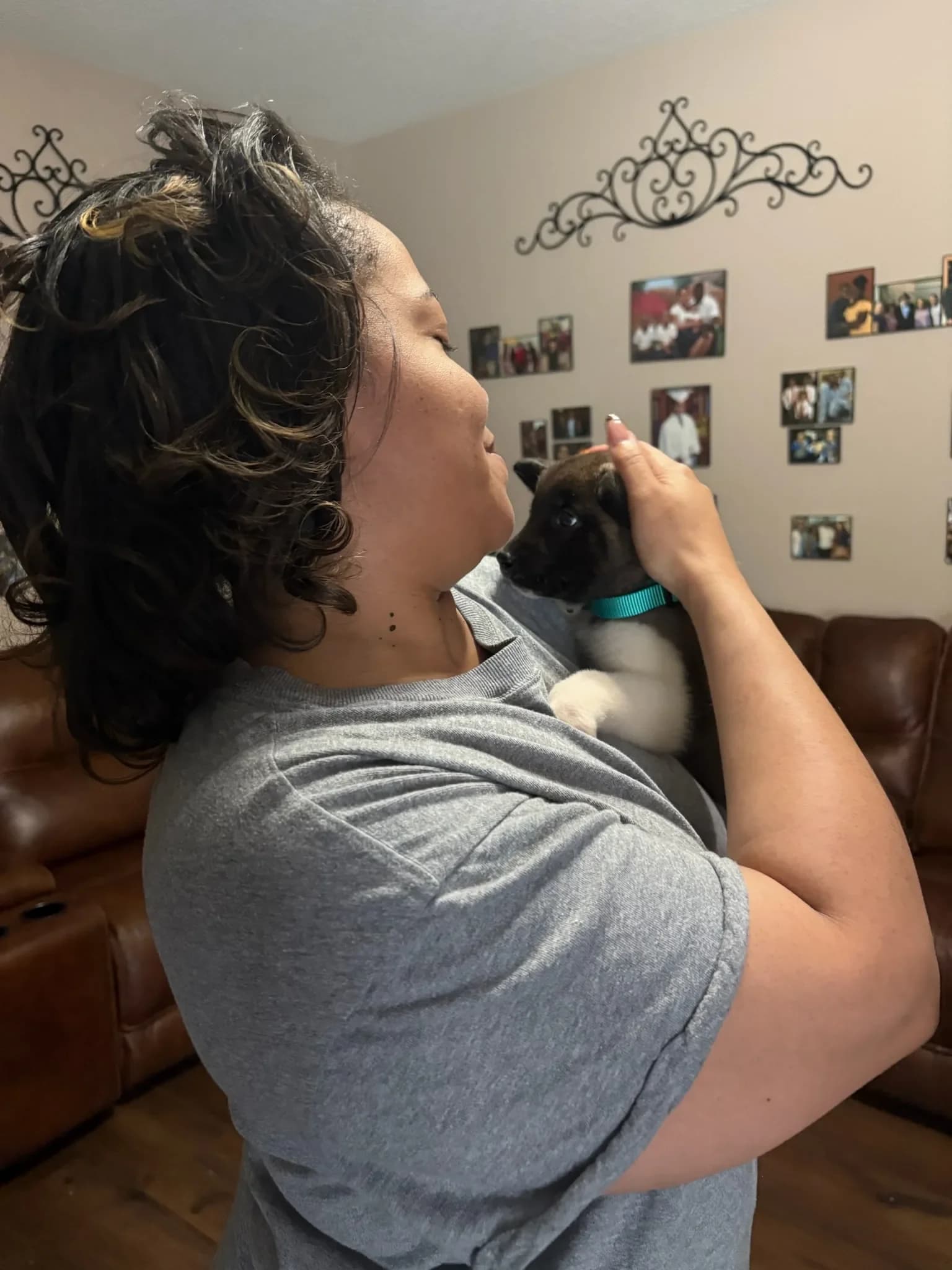 The Briwder family with an Akita puppy